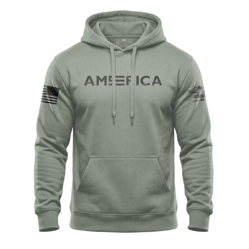 American flag hoodie with "AMERICA" text, casual streetwear style.