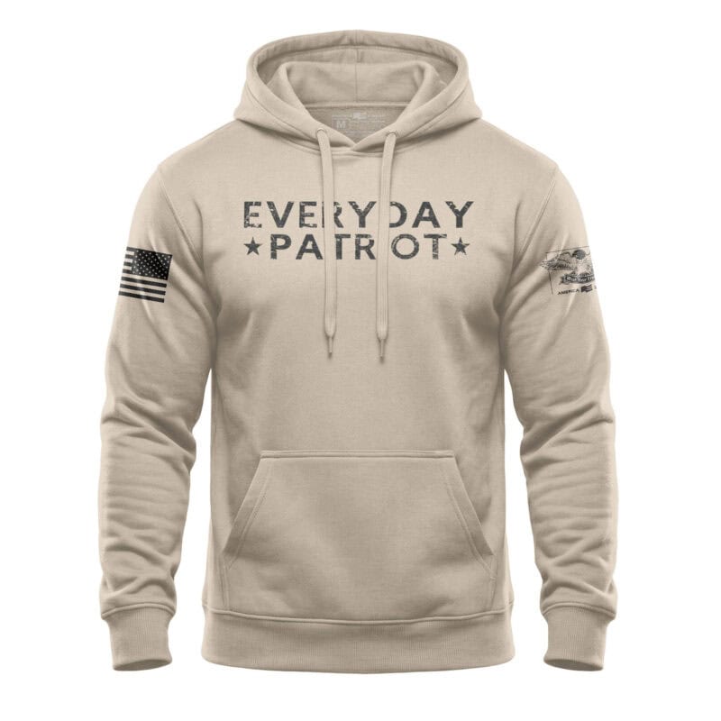 Men's beige hoodie with patriotic USA flag and eagle patches, "Everyday Patriot" text.