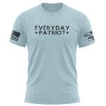 Patriotic light blue T-shirt with "Everyday Patriot" text and American flag patch on sleeve.