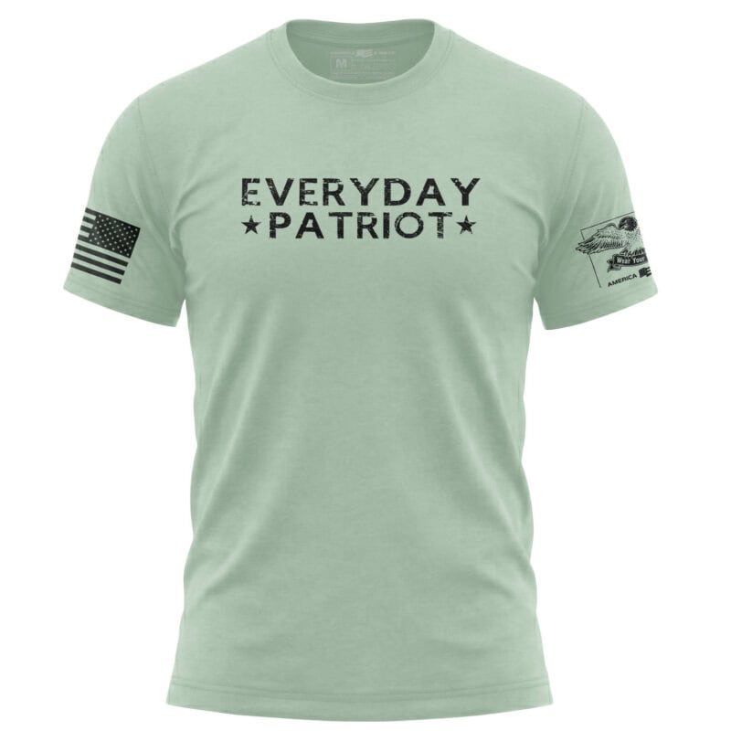 Patriotic green T-shirt with "Everyday Patriot" text and American flag patch on sleeve.