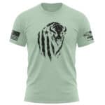 Men's mint green T-shirt with distressed buffalo graphic and American flag patches.