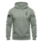 Minimalist eagle hoodie with American flag patch on sleeve in sage color.