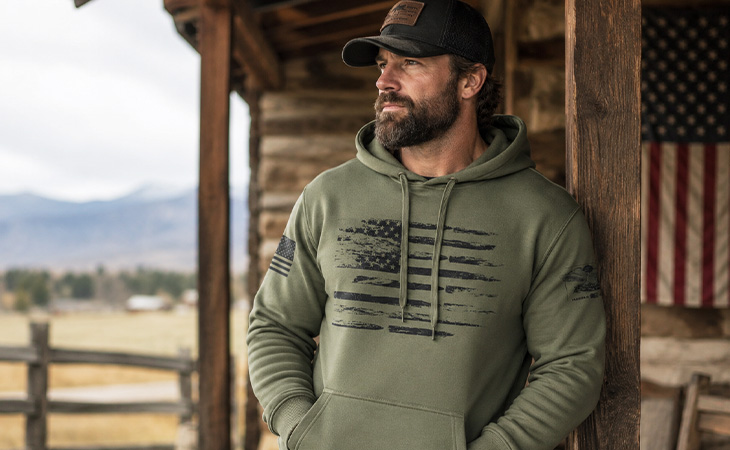 Man wearing a patriotic American flag hoodie from the America 2 Wear Patriotic Hoodies and Sweatshirts collection