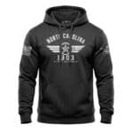 North Carolina First in Flight 1903 T-Shirt with distressed winged-star aviation graphic and patriotic sleeve designs