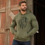 Men's olive green hoodie with distressed buffalo graphic, casual outdoor style.